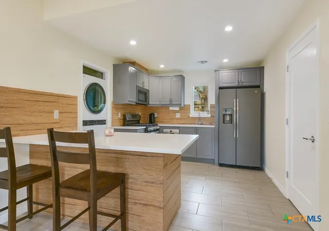 Photo 2 of Condo for sale at 1705 E 14th Street #B, Austin, TX 78702 | MLS# 619613 | Listing updated on 2026-08-12