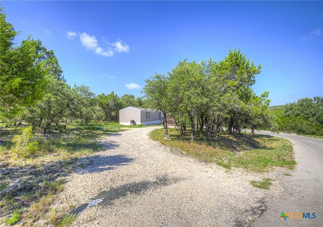 Photo 3 of Manufactured home for sale at 625 Cypress Dr, Canyon Lake, TX 78133 | MLS# 622722 | Listing updated on 2026-09-07