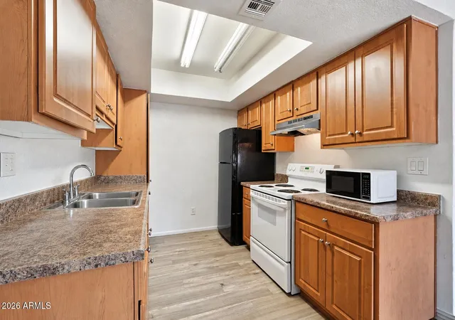 Listing Photo 1 - Condo for sale in building located at 3810 N Maryvale Pkwy, Phoenix, AZ 85031 - Unit #2055