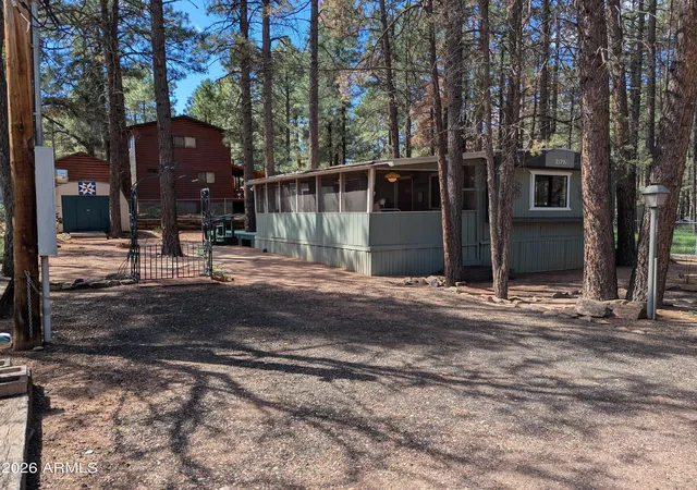Photo 1 of Manufactured home for sale at 2179 N Woods Dr, Overgaard, AZ 85933 | MLS# 7075146 | Listing updated on 2026-09-08
