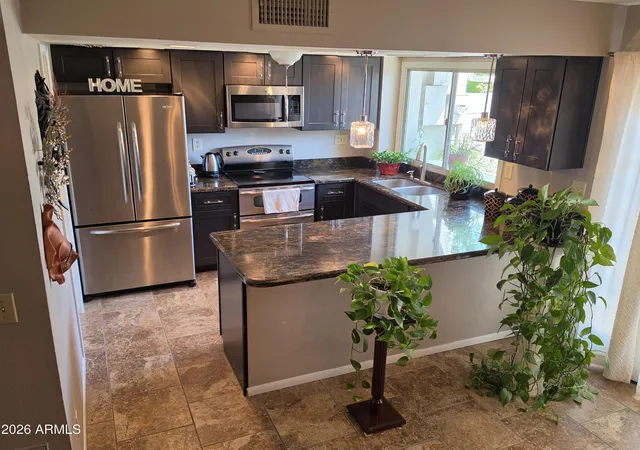 Photo 1 of Townhouse for sale at 4949 N Granite Reef Rd, Scottsdale, AZ 85251 | MLS# 7074372 | Listing updated on 2026-09-03