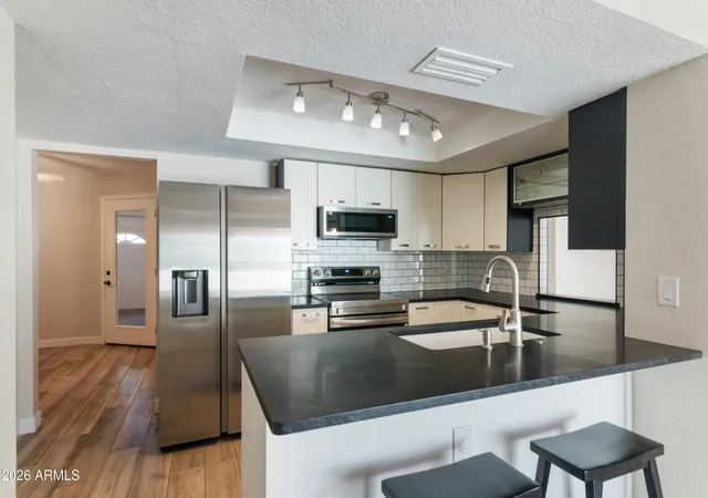 Photo 3 of Townhouse for sale at 7717 S Heather Dr, Tempe, AZ 85284 | MLS# 7075600 | Listing updated on 2026-09-11