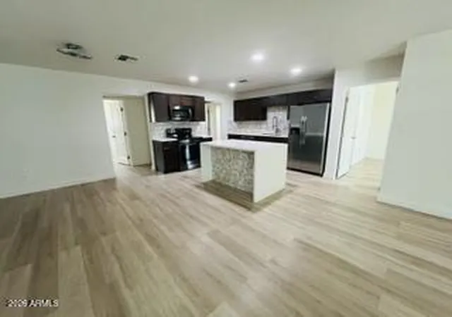 Photo 4 of Single family home for sale at 6930 W Lewis Ave, Phoenix, AZ 85035 | MLS# 7075447 | Listing updated on 2026-09-04