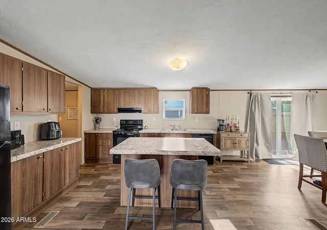 Photo 3 of Manufactured home for sale at 22425 W Pleasant Ln, Wittmann, AZ 85361 | MLS# 7076421 | Listing updated on 2026-09-19