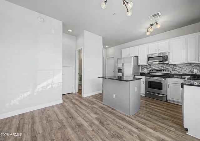 Photo 3 of Townhouse for sale at 1350 S Greenfield Rd #1033, Mesa, AZ 85206 | MLS# 7076881 | Listing updated on 2026-09-12