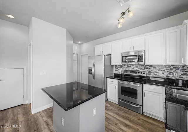 Photo 3 of Townhouse for sale at 1350 S Greenfield Rd #1033, Mesa, AZ 85206 | MLS# 7076881 | Listing updated on 2026-09-12