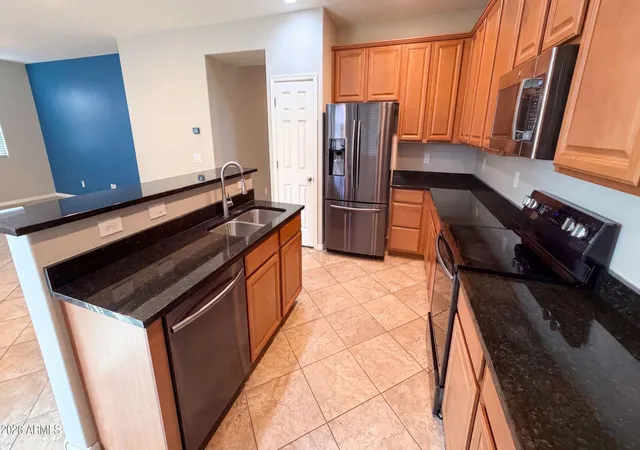 Photo 2 of Single family home for sale at 11719 W Port Au Prince Ln, El Mirage, AZ 85335 | MLS# 7076913 | Listing updated on 2026-09-08