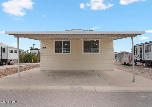 Photo 3 of Manufactured home for sale at 320 E Mckellips Rd #209, Mesa, AZ 85201 | MLS# 7077688 | Listing updated on 2026-09-11