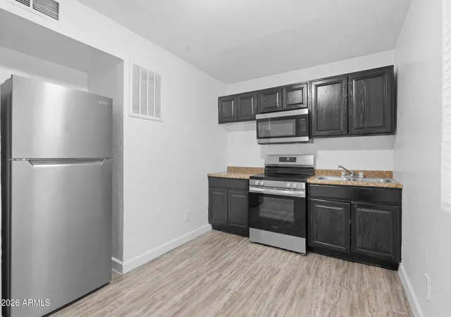 Photo 4 of Townhouse for sale at 1022 N 22nd Place, Phoenix, AZ 85006 | MLS# 7077446 | Listing updated on 2026-10-23