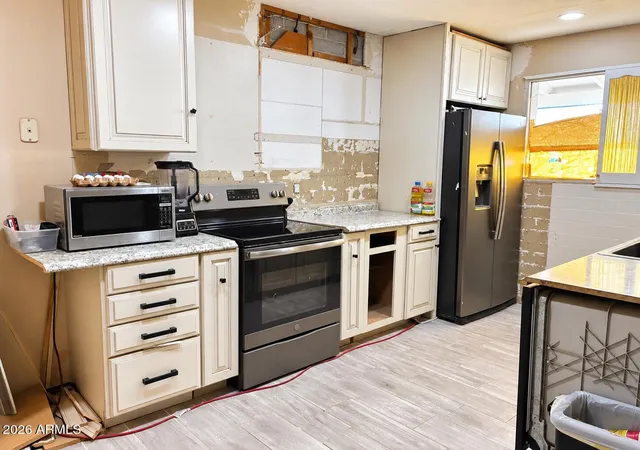 Photo 4 of Single family home for sale at 1557 N Fern Cir, Mesa, AZ 85201 | MLS# 7077876 | Listing updated on 2026-09-11