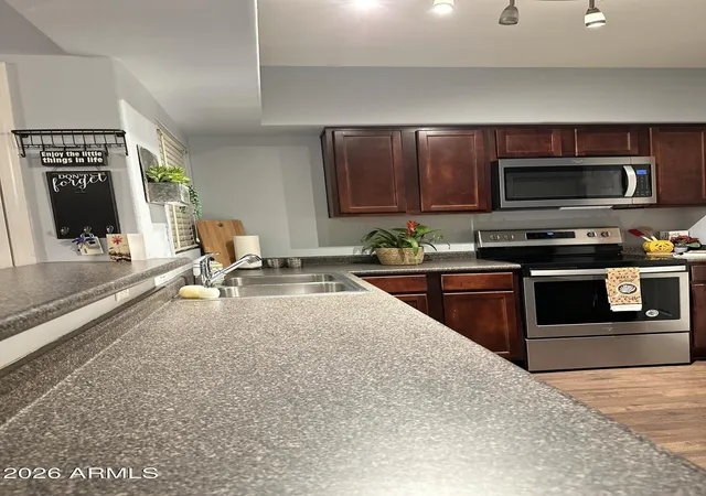 Listing Photo 1 - Condo for sale in building located at 15095 N Thompson Peak Pkwy, Scottsdale, AZ 85260 - Unit #2115