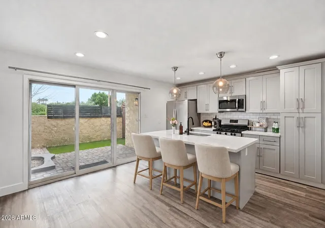 Listing Photo 1 - Condo for sale in building located at 4950 N Miller Rd, Scottsdale, AZ 85251 - Unit #104