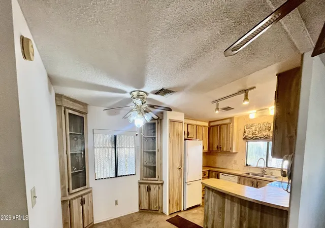 Photo 1 of Manufactured home for sale at 11596 W Sierra Dawn Blvd #163, Surprise, AZ 85378 | MLS# 7099250 | Listing updated on 2026-10-28