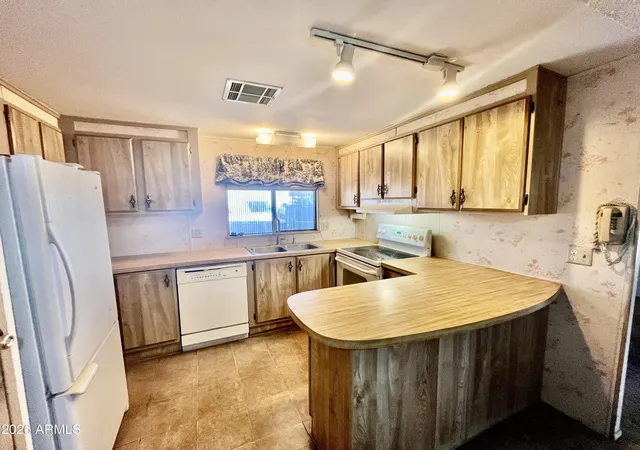 Photo 2 of Manufactured home for sale at 11596 W Sierra Dawn Blvd #163, Surprise, AZ 85378 | MLS# 7099250 | Listing updated on 2026-10-28