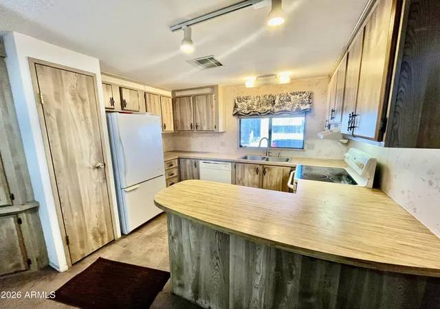 Photo 3 of Manufactured home for sale at 11596 W Sierra Dawn Blvd #163, Surprise, AZ 85378 | MLS# 7099250 | Listing updated on 2026-10-28