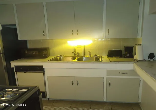 Listing Photo 1 - Condo for sale in building located at 6125 E Indian School Rd, Scottsdale, AZ 85251 - Unit #206