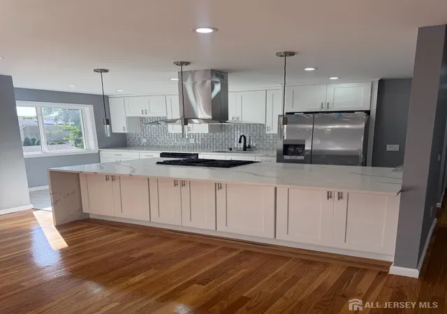 Photo 4 of Single family home for sale at 704 Wood Ave, Colonia, NJ 07067 | MLS# 2700658R | Listing updated on 2026-09-22