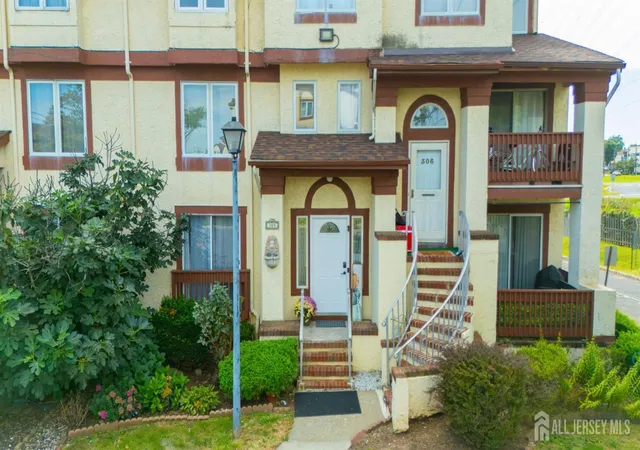 Photo 1 of Townhouse for sale at 305 Michaels Ct, Woodbridge, NJ 07095 | MLS# 2704652R | Listing updated on 2026-09-29