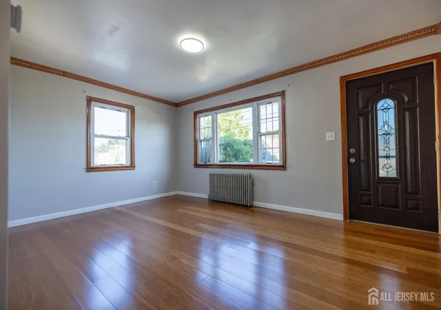Photo 3 of Single family home for sale at 15 Clinton Ave, Keasbey, NJ 08832 | MLS# 2703701R | Listing updated on 2026-09-18