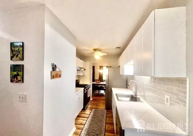 Photo 3 of Townhouse for sale at 15 Saddle Ct, Tinton Falls, NJ 07753 | MLS# 2704380R | Listing updated on 2026-09-12