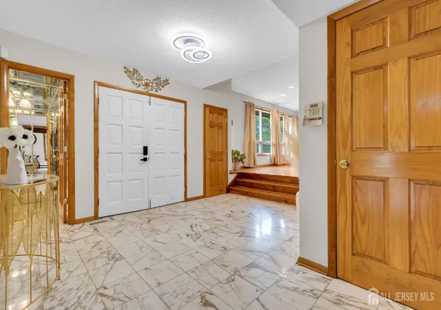 Photo 3 of Single family home for sale at 16 Woodmere Rd, North Brunswick, NJ 08902 | MLS# 2704954R | Listing updated on 2026-09-28