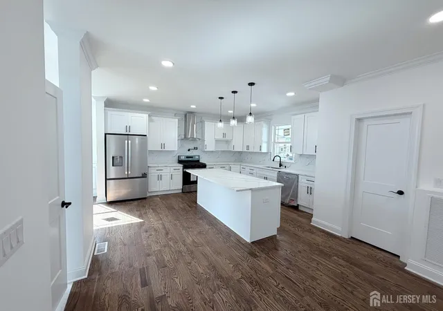 Photo 3 of Single family home for sale at 28 S Mckinley Ave, Iselin, NJ 08830 | MLS# 2704357R | Listing updated on 2026-09-26