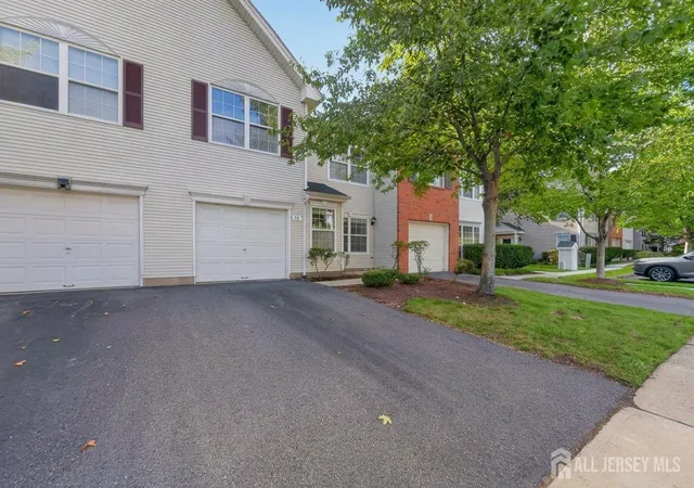 Photo 2 of Townhouse for sale at 58 Windsong Cir, East Brunswick, NJ 08816 | MLS# 2704154R | Listing updated on 2026-09-23