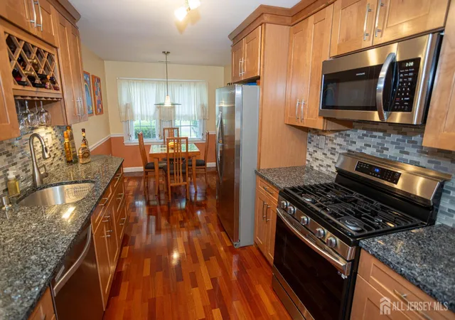 Photo 2 of Townhouse for sale at 113 Woodmere Dr, Parlin, NJ 08859 | MLS# 2704320R | Listing updated on 2026-10-05