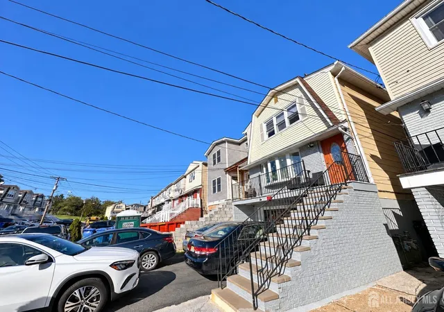 Photo 3 of Multi family home for sale at 109 111 Judy Dr, Keasbey, NJ 08832 | MLS# 2704540R | Listing updated on 2026-09-25