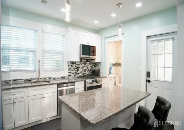 Photo 3 of Single family home for sale at 77 Douglas St, Fords, NJ 08863 | MLS# 2707011R | Listing updated on 2026-10-29