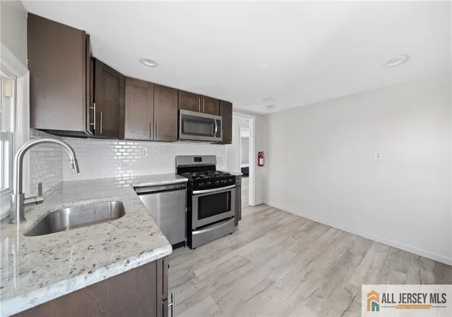 Photo 3 of Multi family home for sale at 35 Lavern St, Sayreville, NJ 08872 | MLS# 2770444M | Listing updated on 2026-09-04