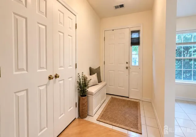 Photo 2 of Condo for sale at 403 Cypress Ln, East Brunswick, NJ 08816 | MLS# 2704980R | Listing updated on 2026-09-23
