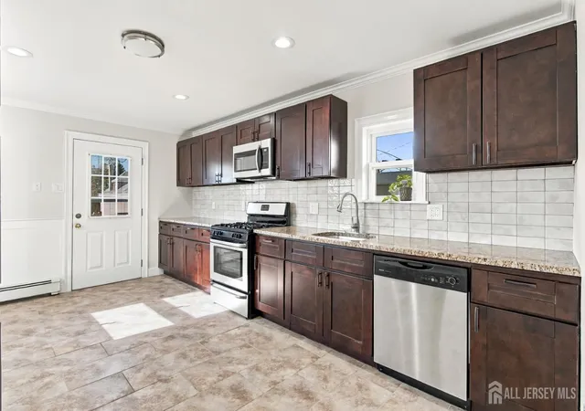 Photo 3 of Single family home for sale at 240 Midland Ave, Sayreville, NJ 08879 | MLS# 2706950R | Listing updated on 2026-10-29