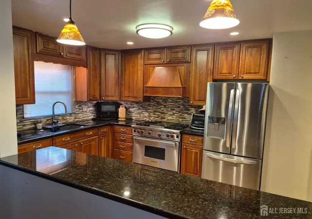 Photo 2 of Single family home for sale at 41 Claremont Ave, Colonia, NJ 07067 | MLS# 2704591R | Listing updated on 2026-09-19