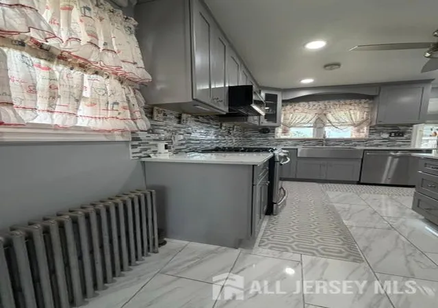 Photo 3 of Single family home for sale at 446 Bruck Ave, Perth Amboy, NJ 08861 | MLS# 2704871R | Listing updated on 2026-09-23