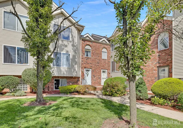 Photo 3 of Townhouse for sale at 402 Holly Dr, Perth Amboy, NJ 08861 | MLS# 2704194R | Listing updated on 2026-09-17
