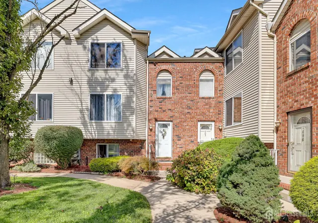 Photo 3 of Townhouse for sale at 402 Holly Dr, Perth Amboy, NJ 08861 | MLS# 2704194R | Listing updated on 2026-09-17