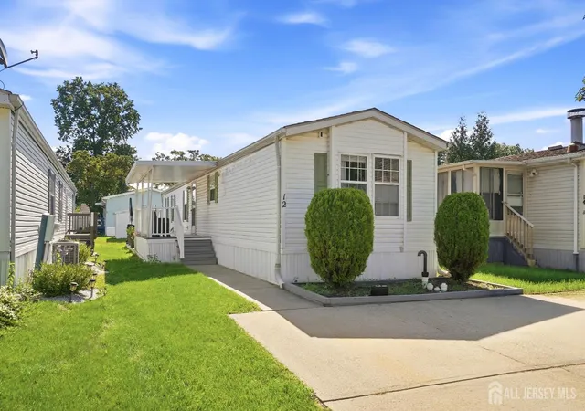 Photo 2 of Manufactured home for sale at 12 Twain Rd, North Brunswick, NJ 08902 | MLS# 2704484R | Listing updated on 2026-09-29