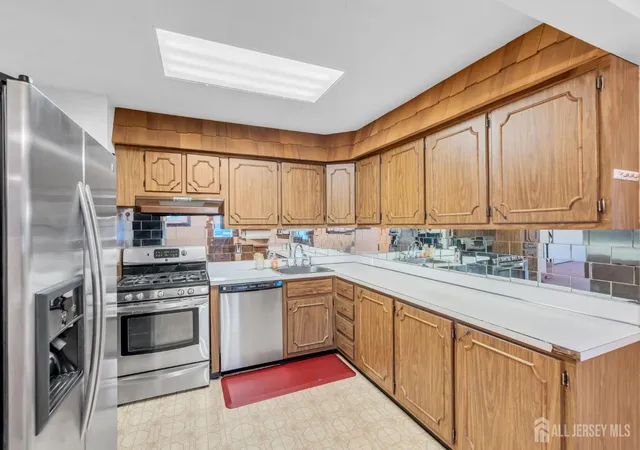 Photo 4 of Single family home for sale at 140 Camelot Dr, Port Reading, NJ 07064 | MLS# 2703656R | Listing updated on 2026-09-26
