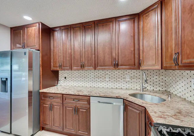 Photo 1 of Townhouse for sale at 73 Goodwin Dr, North Brunswick, NJ 08902 | MLS# 2704193R | Listing updated on 2026-09-12