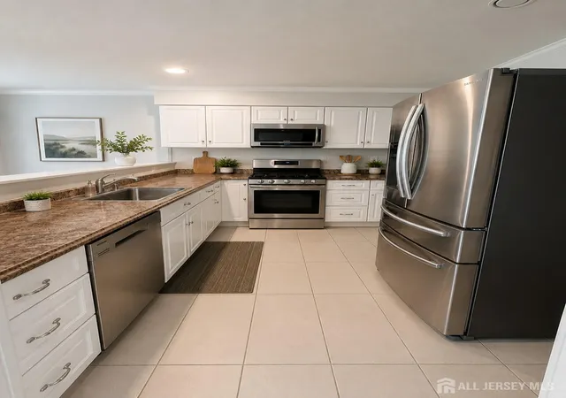 Photo 2 of Townhouse for sale at 231 Mcauliffe Ct, Somerset, NJ 08873 | MLS# 2704146R | Listing updated on 2026-09-09