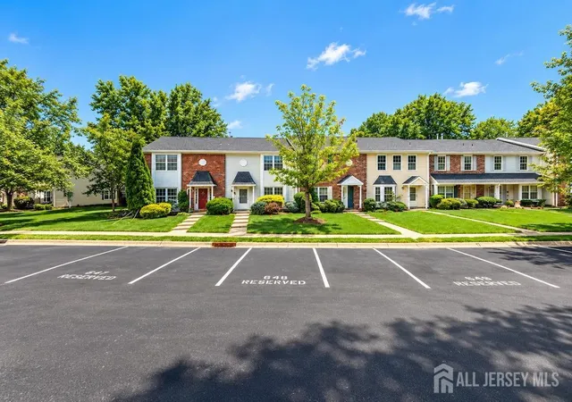 Photo 2 of Townhouse for sale at 400 Mcdowell Dr, East Brunswick, NJ 08816 | MLS# 2704207R | Listing updated on 2026-09-23