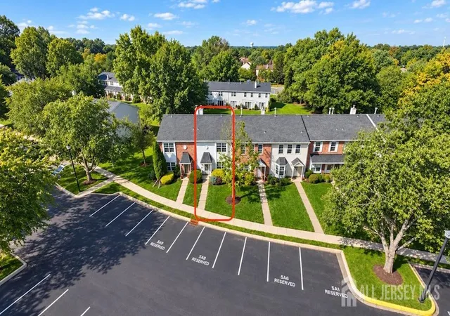 Photo 3 of Townhouse for sale at 400 Mcdowell Dr, East Brunswick, NJ 08816 | MLS# 2704207R | Listing updated on 2026-09-23