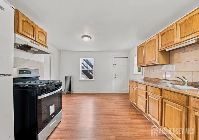 Photo 3 of Multi family home for sale at 216 Amherst St, Highland Park, NJ 08904 | MLS# 2705039R | Listing updated on 2026-09-29