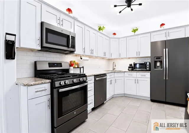Photo 3 of Condo for sale at 1304 Plymouth Rd, North Brunswick, NJ 08902 | MLS# 2770451M | Listing updated on 2026-09-26