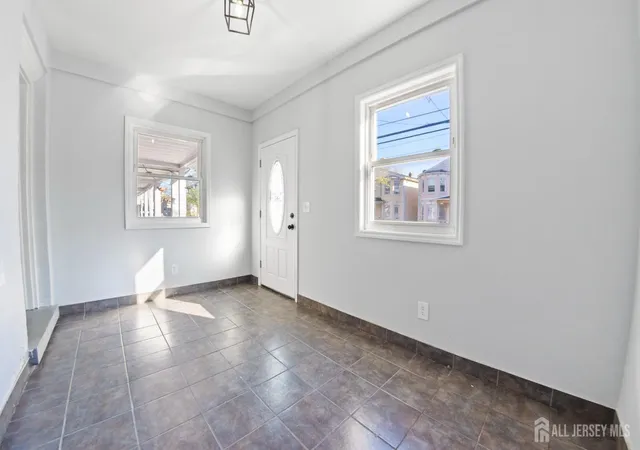 Photo 2 of Single family home for sale at 156 Lewis St, Perth Amboy, NJ 08861 | MLS# 2703887R | Listing updated on 2026-09-25