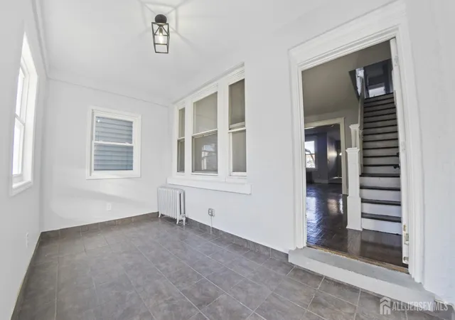 Photo 3 of Single family home for sale at 156 Lewis St, Perth Amboy, NJ 08861 | MLS# 2703887R | Listing updated on 2026-09-25