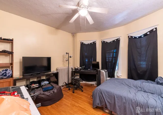 Photo 2 of Multi family home for sale at 28 Suydam St, New Brunswick, NJ 08901 | MLS# 2703934R | Listing updated on 2026-09-28