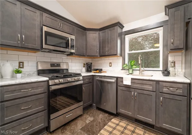 Photo 3 of Single family home for sale at 3411 Dunmore Ave Nw, Canton, OH 44708 | MLS# 5216347 | Listing updated on 2026-09-08