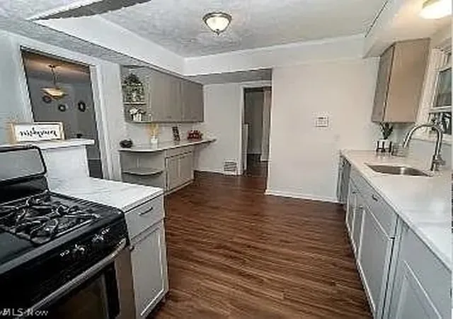 Photo 3 of Single family home for sale at 335 Beechwood Dr, Akron, OH 44320 | MLS# 5222269 | Listing updated on 2026-09-10
